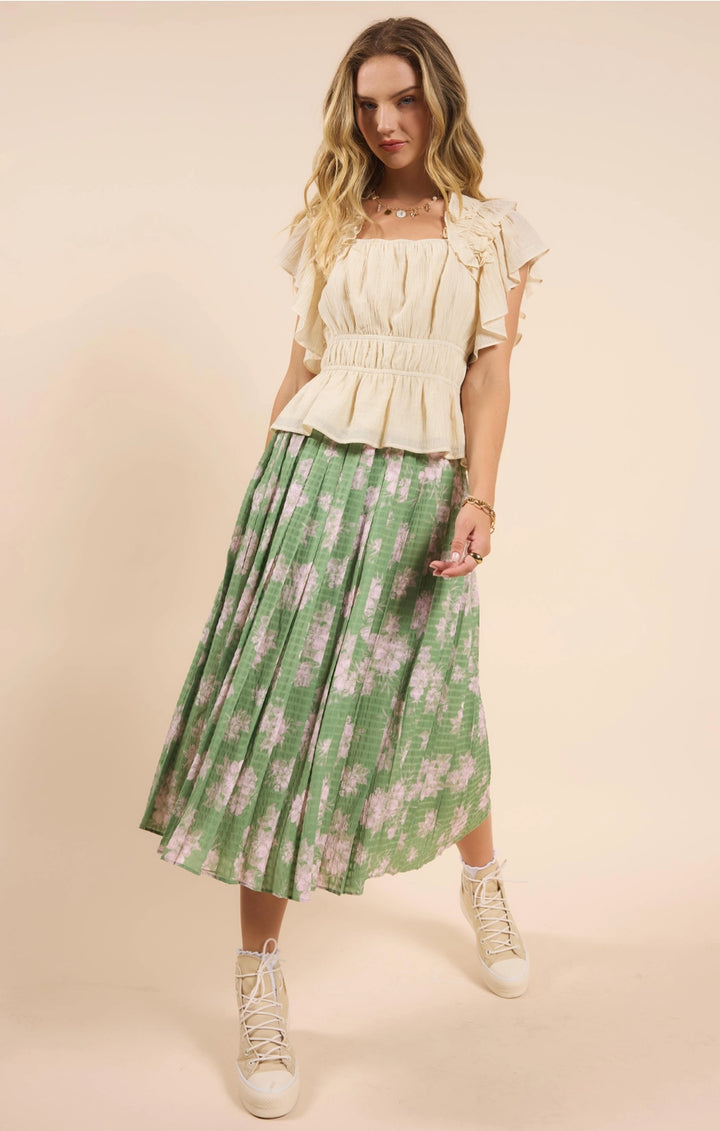 RAINY DAYS PLEATED MIDI SKIRT